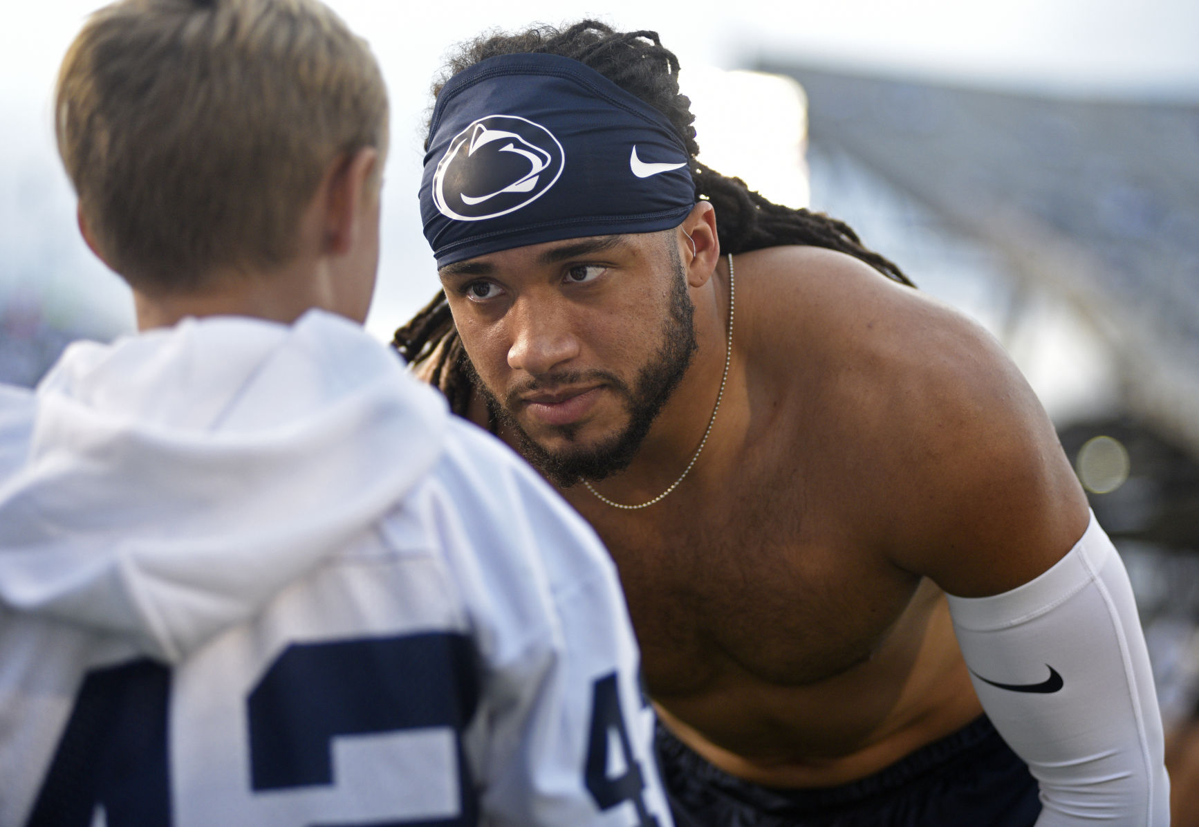 Football vs. Michigan, Sutherland (26) and Mason Young